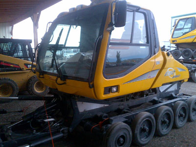 Older Bombardier model snow groomer sold by Rocky Mountain Snow Cats.